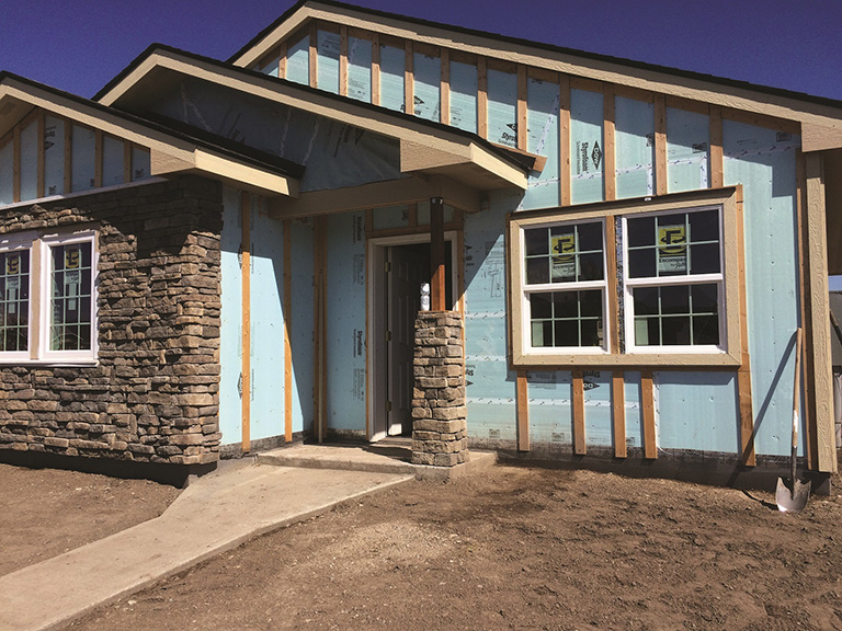 Pine Habitat Picture of house built by Habitat for Humanity in partnership with BetterBuiltNW using high efficiency standard.